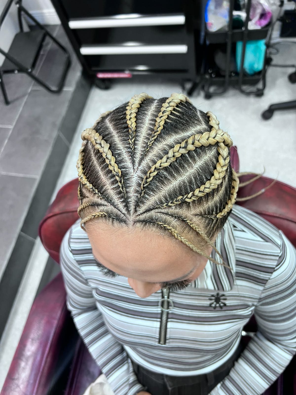 Blonde stitch cornrows with clean precision parts