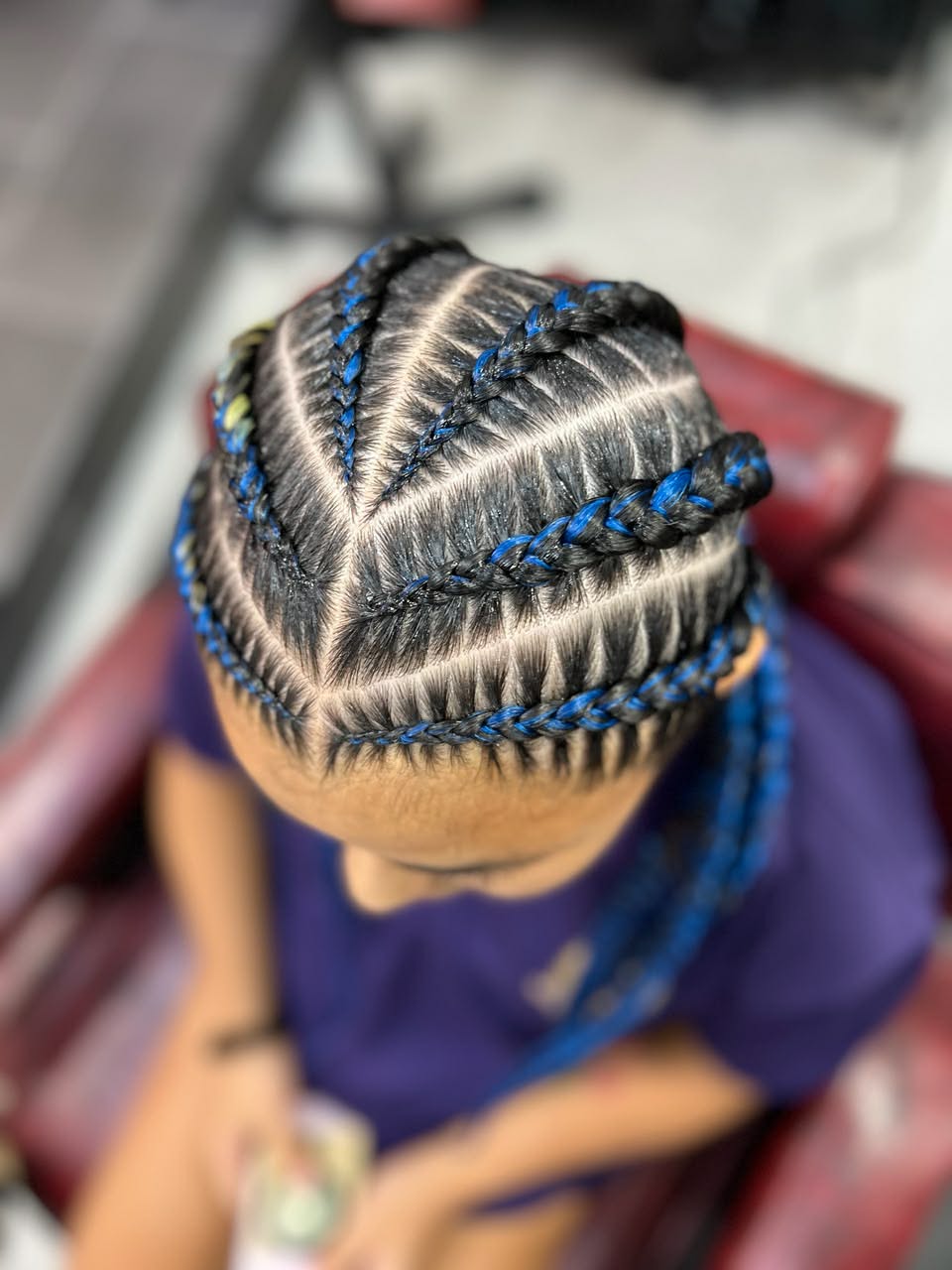 Stitch braids with blue accents in a zigzag design
