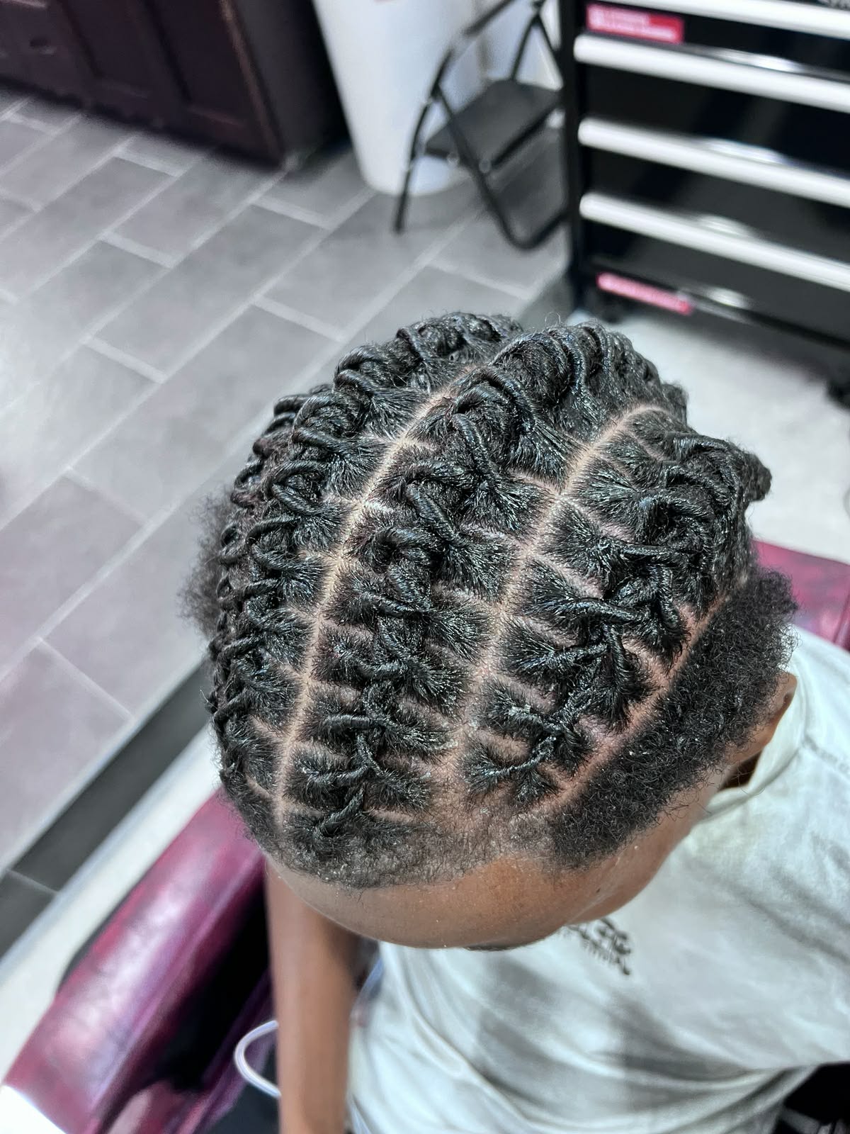 Two-strand twists with diamond grid parting, overhead view
